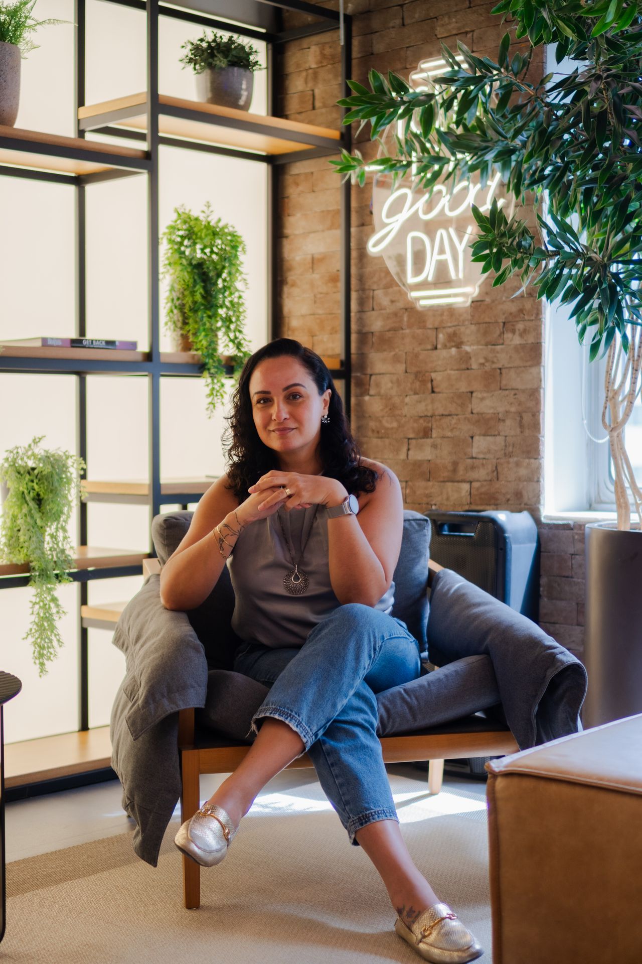 Host in a calm setting, ready to welcome guests