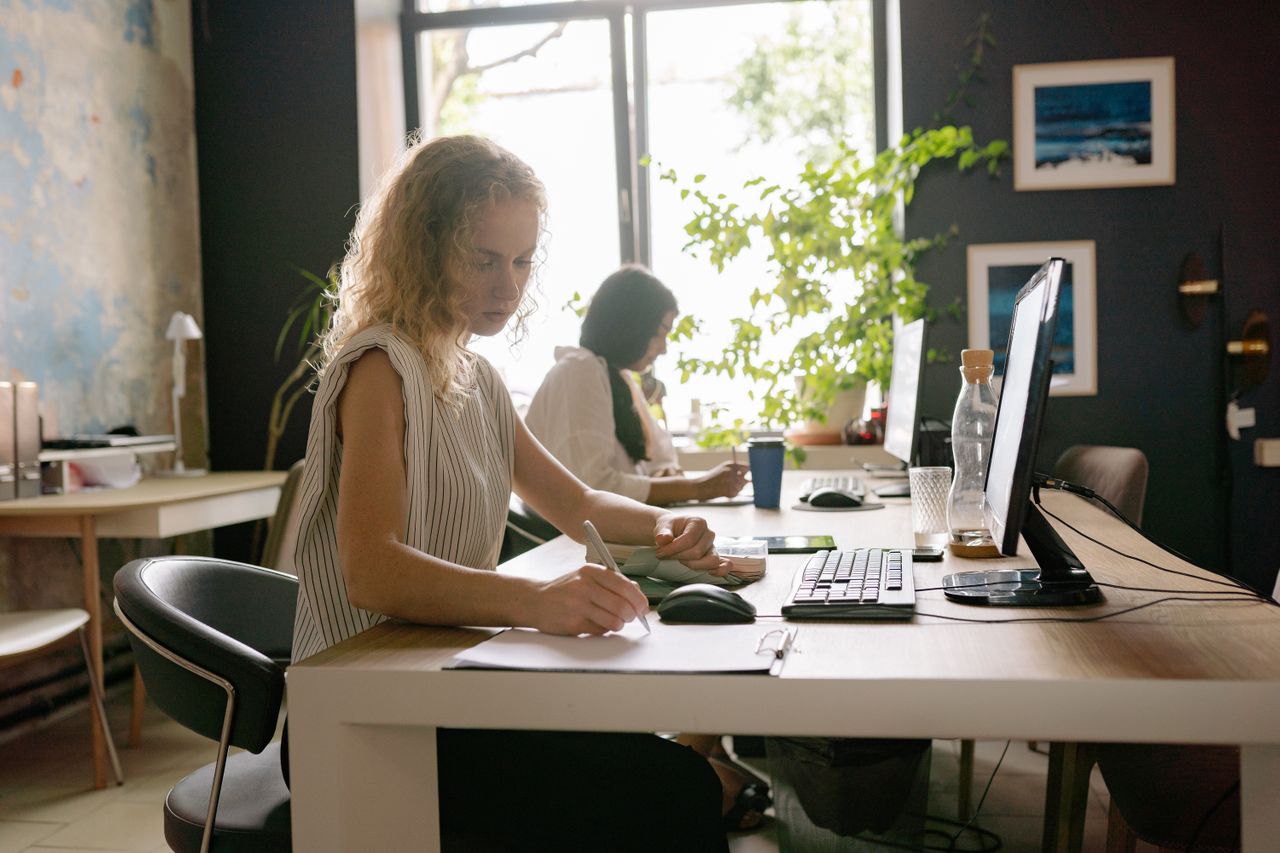 Two colleagues at work in the office